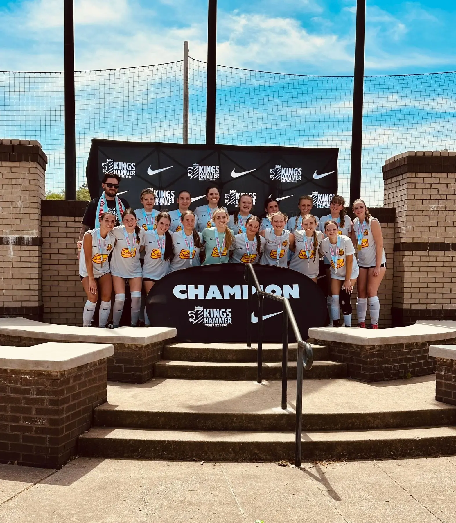 Izabel Barmosz and her team celebrating as Kings Hammer Murfreesboro champions